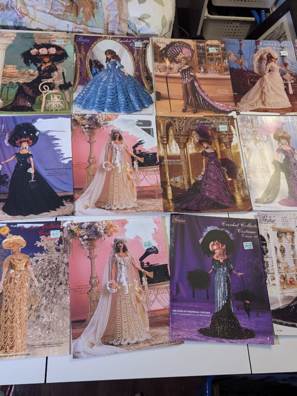 Lot of 17 Paradise Publications Crochet Collector Costume Doll Pattern Booklets